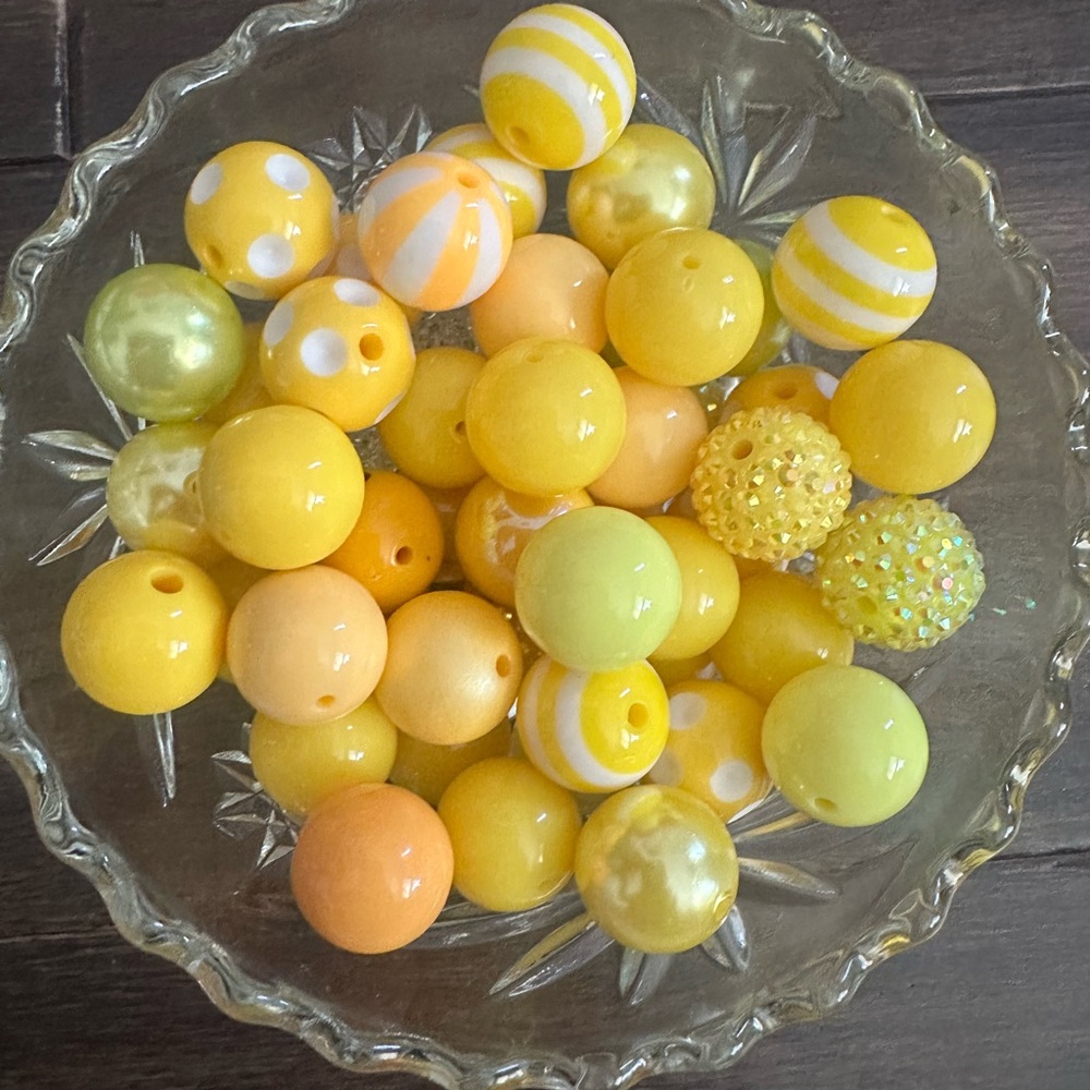 NEW- 50 piece assorted yellow bubblegum beads. (Acrylic)